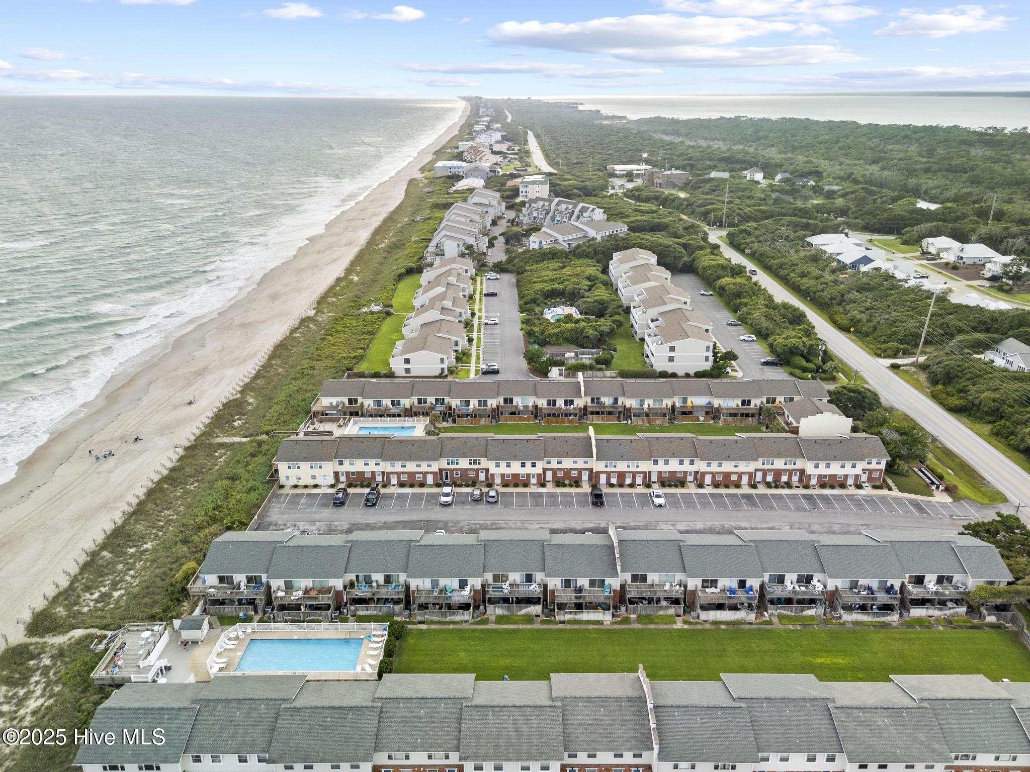 283 Salter Path Road, Unit 102 Pine Knoll Shores, NC 28512 - Photo 33 of 45 DJI_20250825175147_0092_D