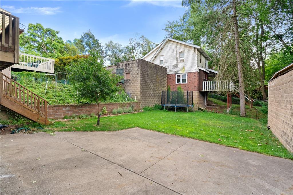 6418 Landview Road Pittsburgh, PA 15217 - Photo 5 of 45 a front view of a house with garden