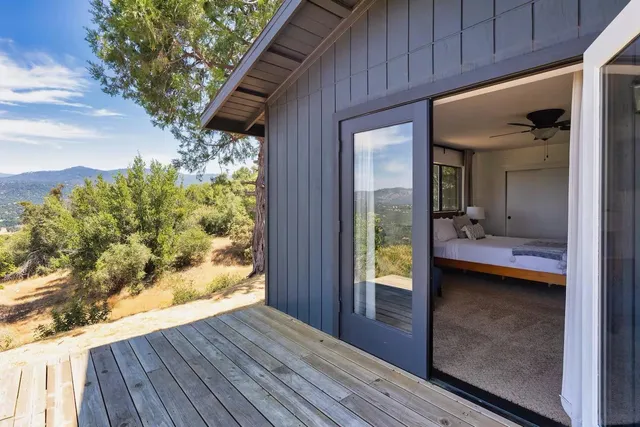 a view of balcony and wooden floor