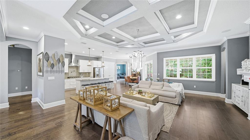 4 Flagship Court Palm Coast, FL 32137 - Photo 4 of 64 a living room with furniture and a large window