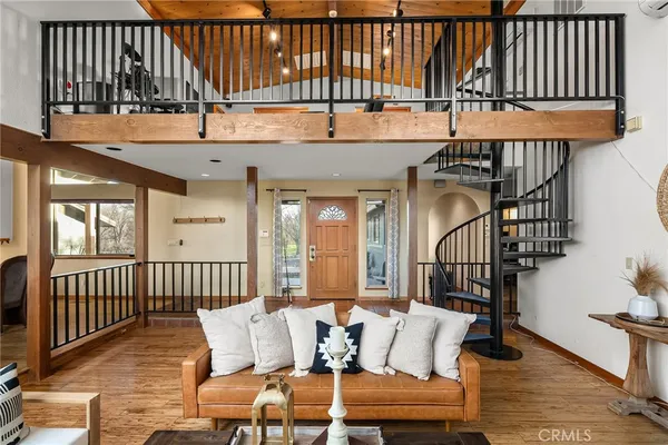 a kitchen with stainless steel appliances a sink and cabinets