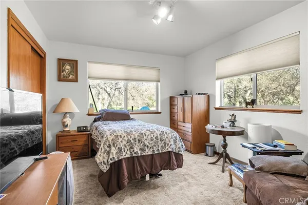 a room with lots of furniture and clutter