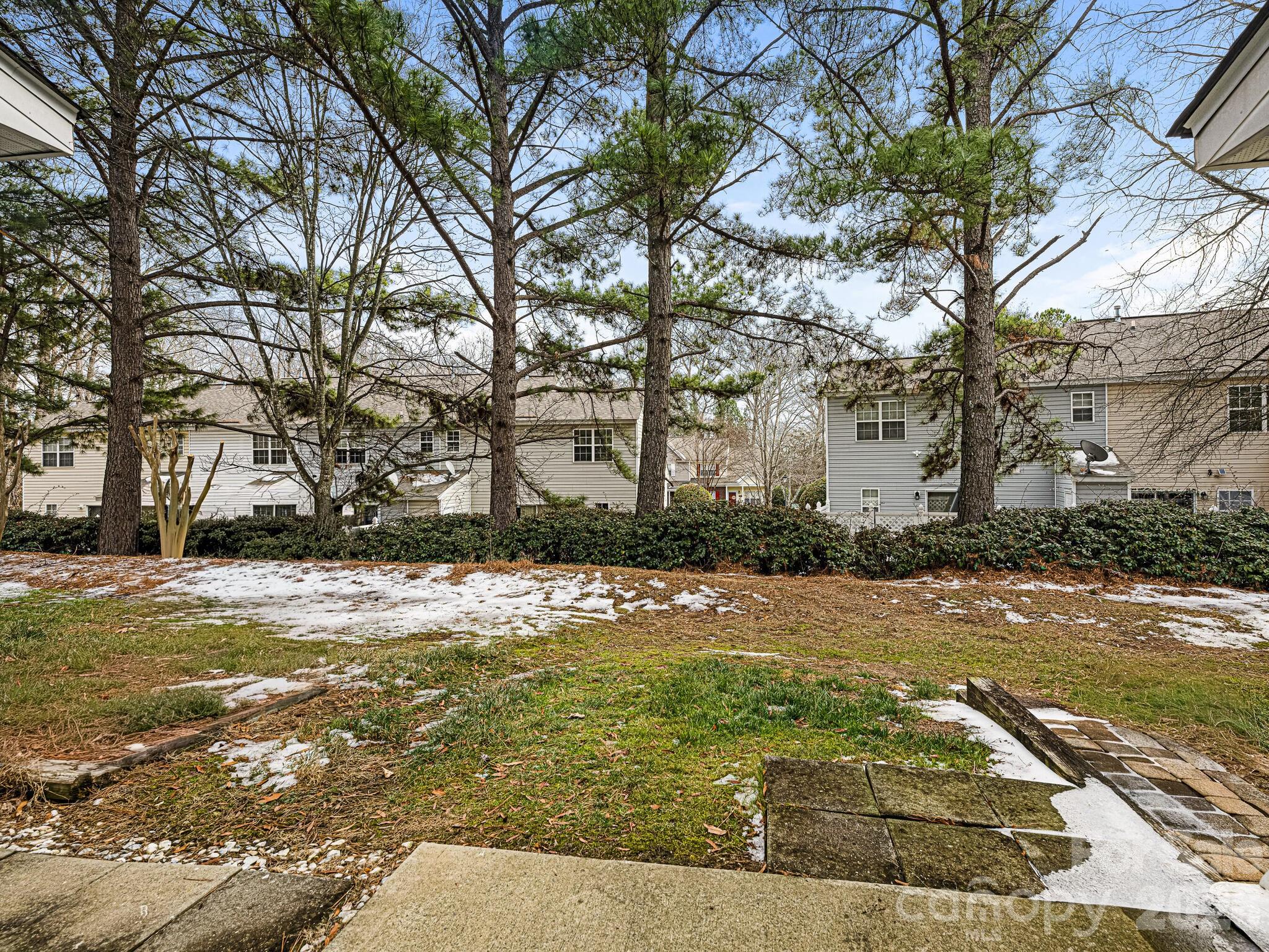 10783 Holly Ridge Boulevard Charlotte, NC 28216 - Photo 18 of 20 a view of a backyard of the house