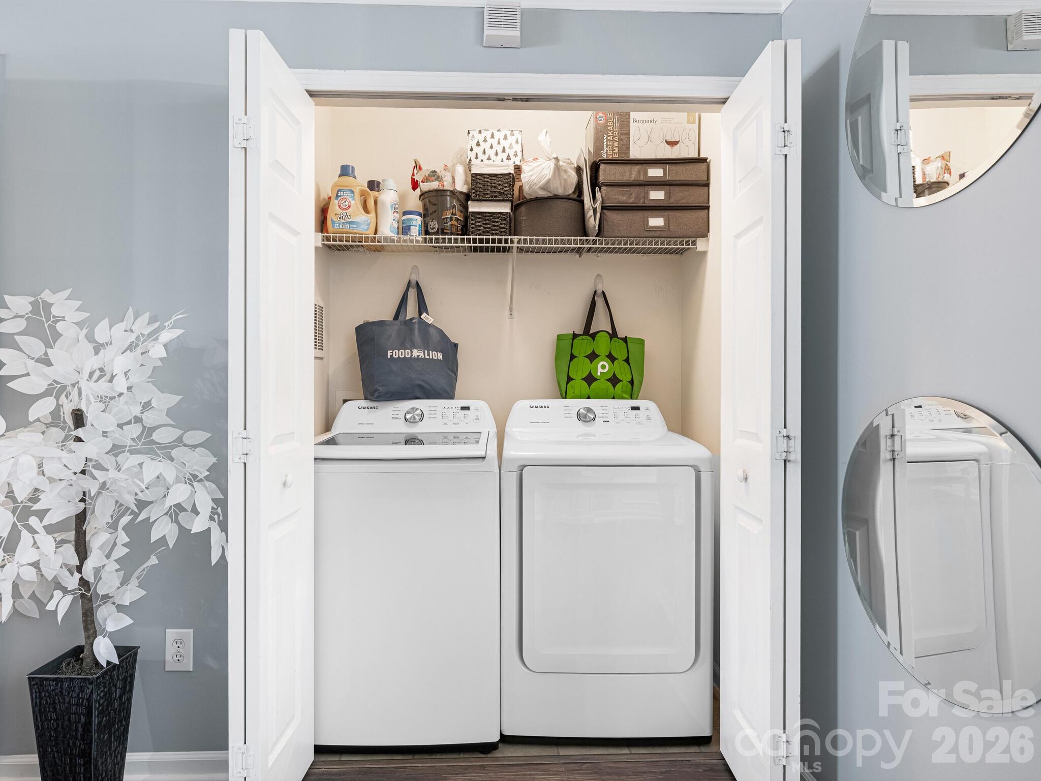 10783 Holly Ridge Boulevard Charlotte, NC 28216 - Photo 8 of 20 a view of washer and dryer