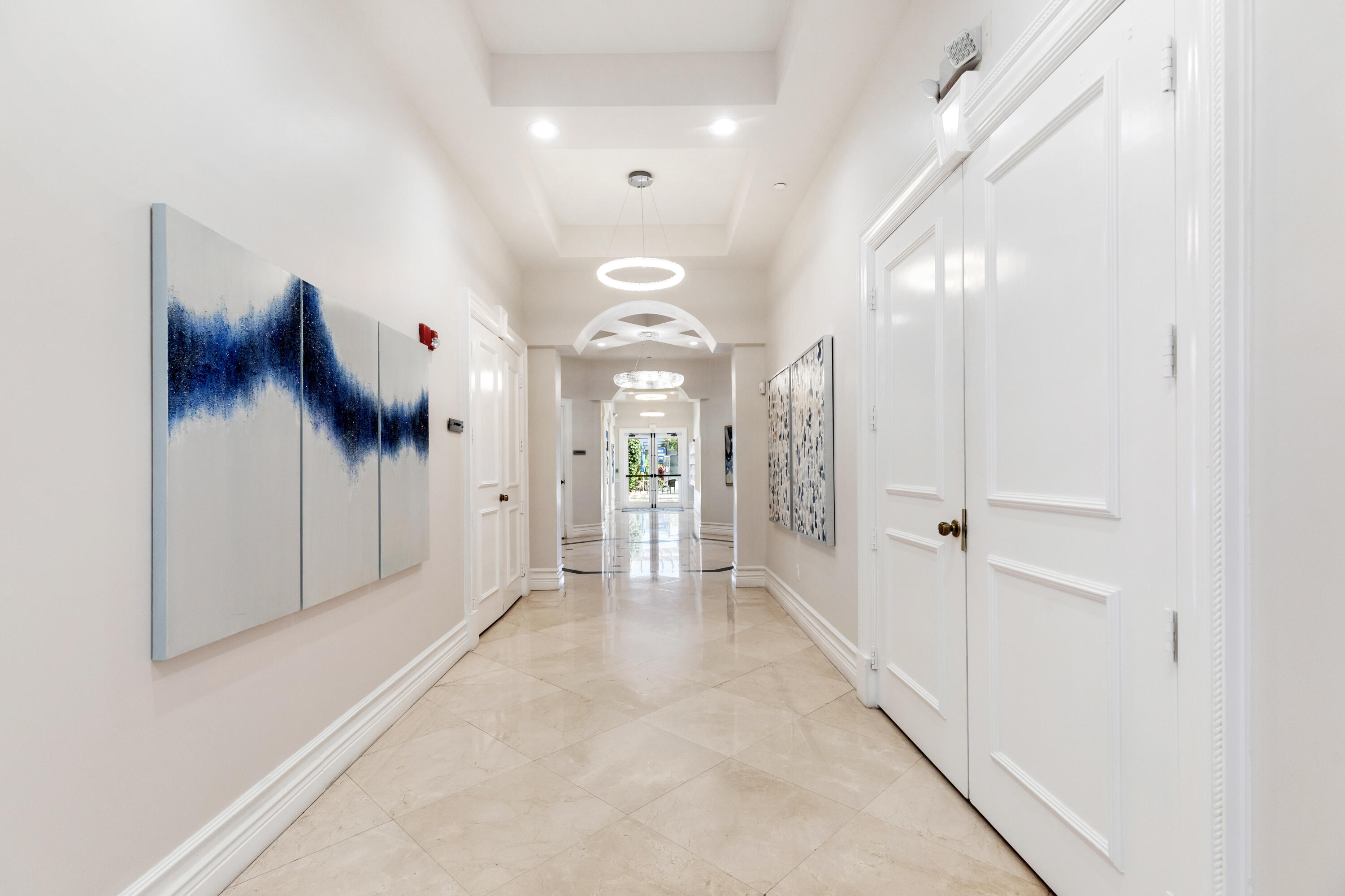 6698 Vía Roma Delray Beach, FL 33446 - Photo 40 of 50 a view of a hallway with a room