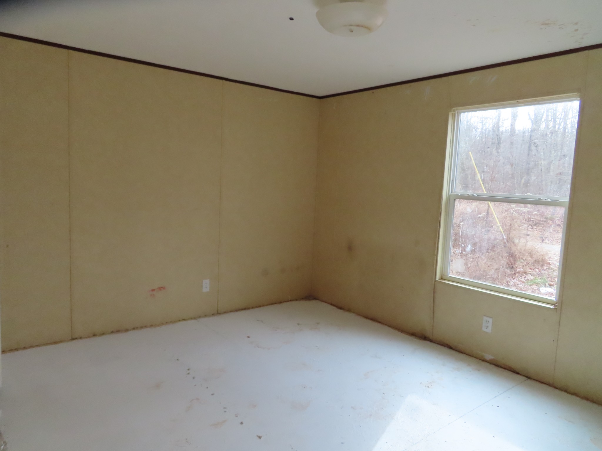 466 Powerline Road Dunlap, TN 37327 - Photo 7 of 9 a view of an empty room with a window