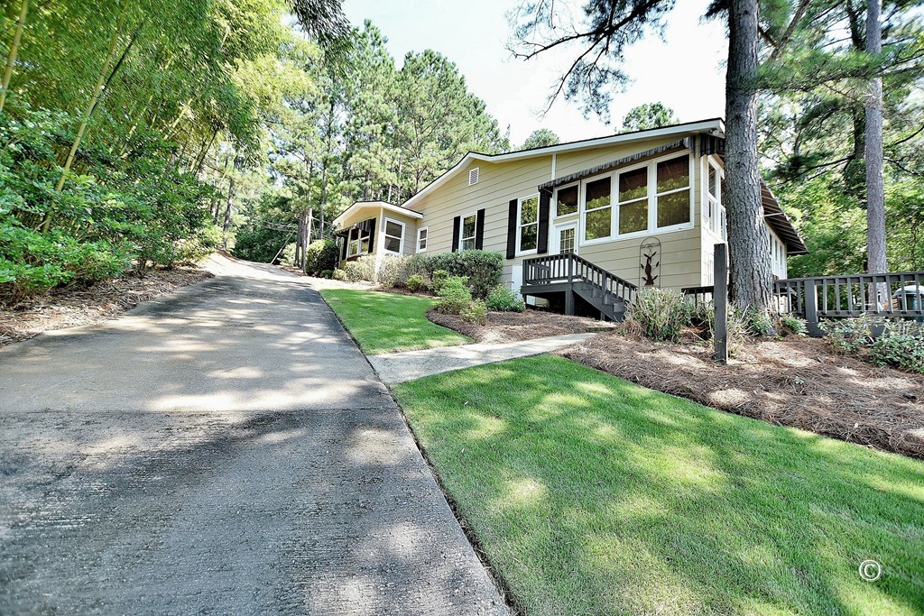 115 Cardinal Road Hamilton, GA 31811 - Photo 32 of 35 Side of home with driveway for boat access