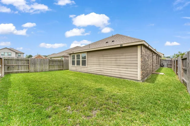 a view of a backyard with a garden
