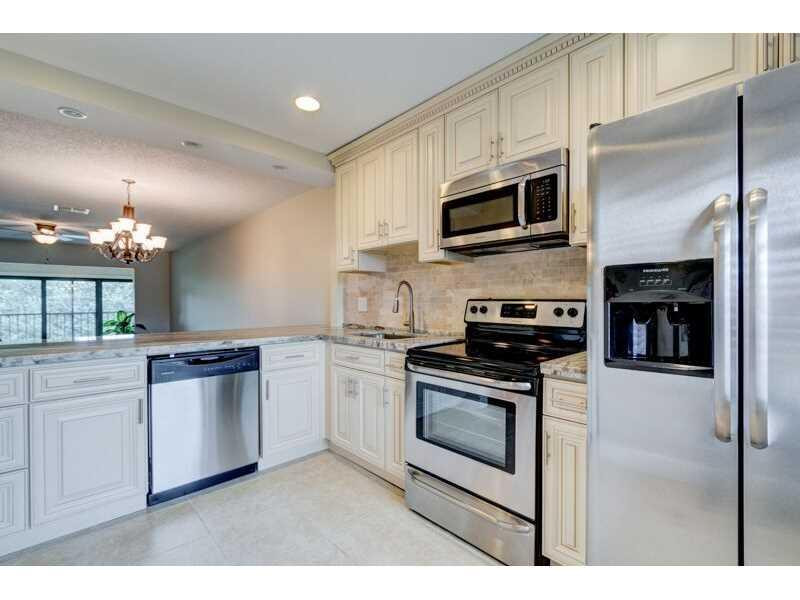 9284 Vista Del Lago, Unit 34D Boca Raton, FL 33428 - Photo 1 of 30 Kitchen.
