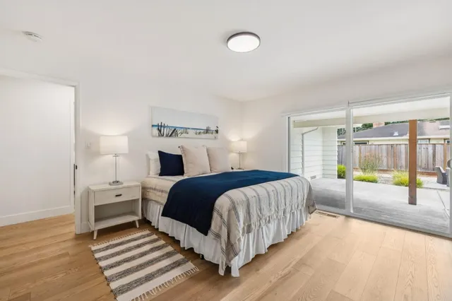 a bathroom with a sink vanity granite tub and shower