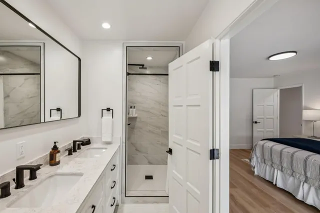 a bed room with a bed and a window