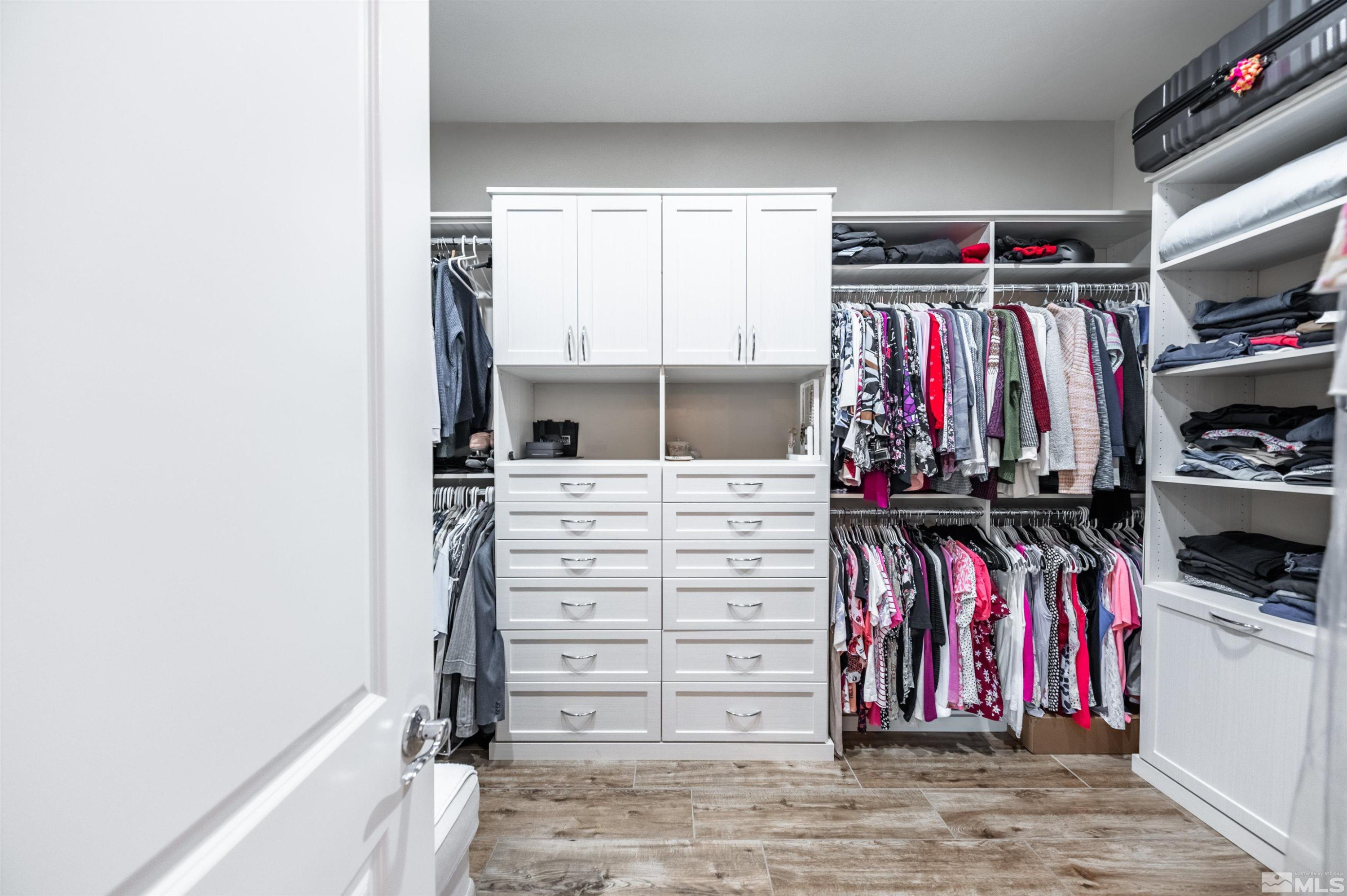 9815 Dyevera Lane Reno, NV 89521 - Photo 26 of 39 a view of walk in closet with clothes and shoes