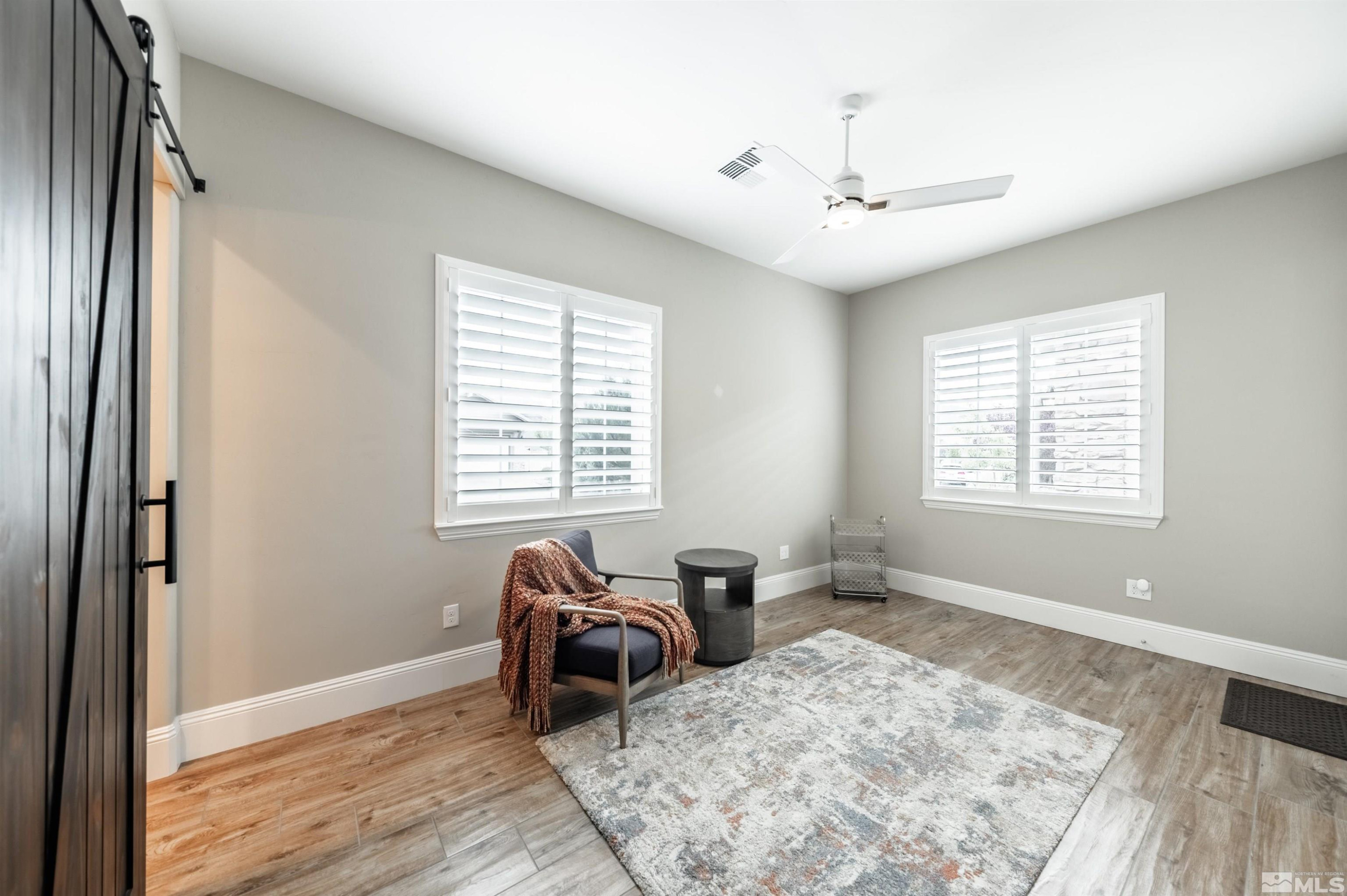 9815 Dyevera Lane Reno, NV 89521 - Photo 29 of 39 a bedroom with bed and a window