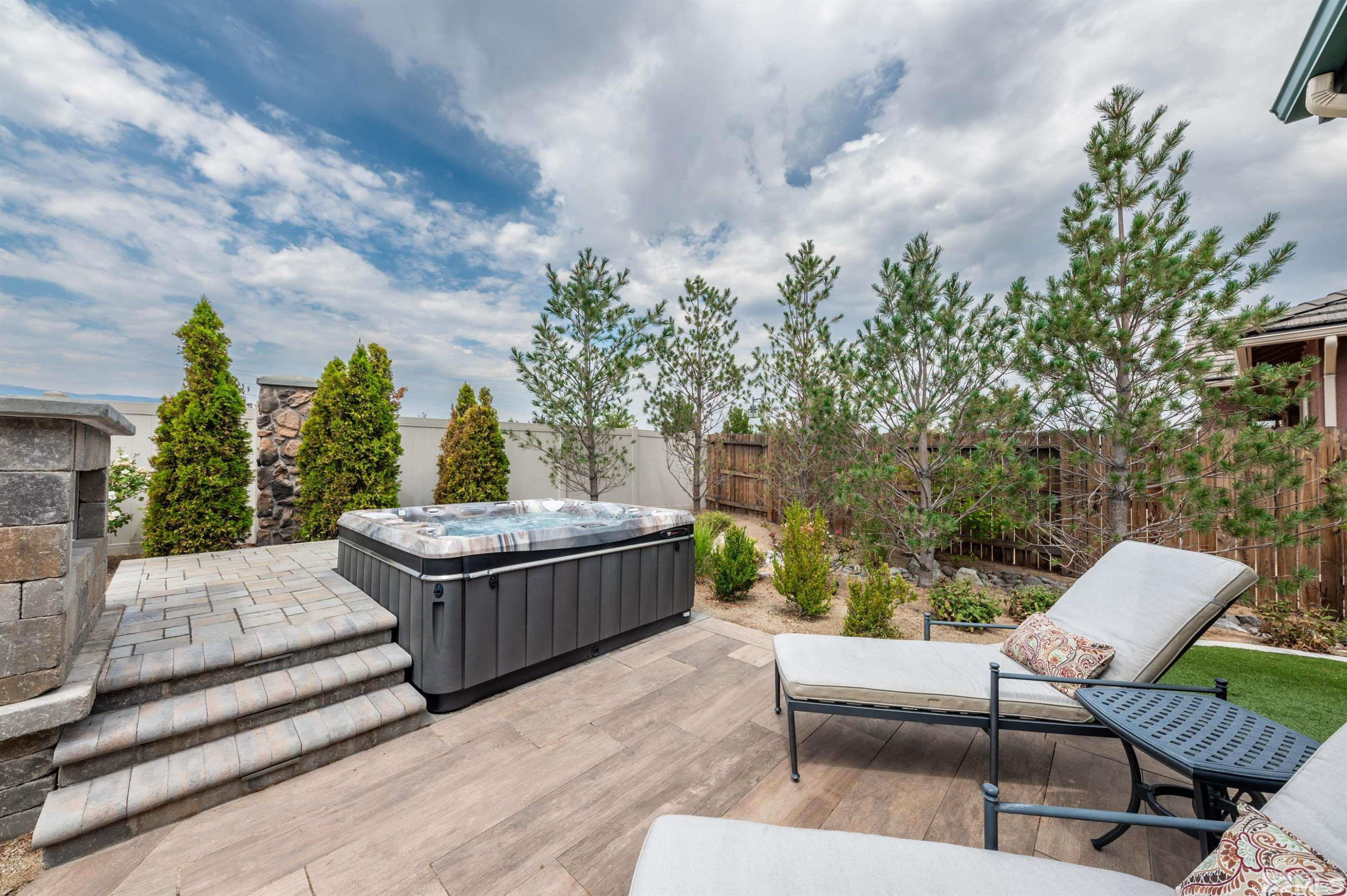9815 Dyevera Lane Reno, NV 89521 - Photo 36 of 39 a view of a chairs and table in the backyard