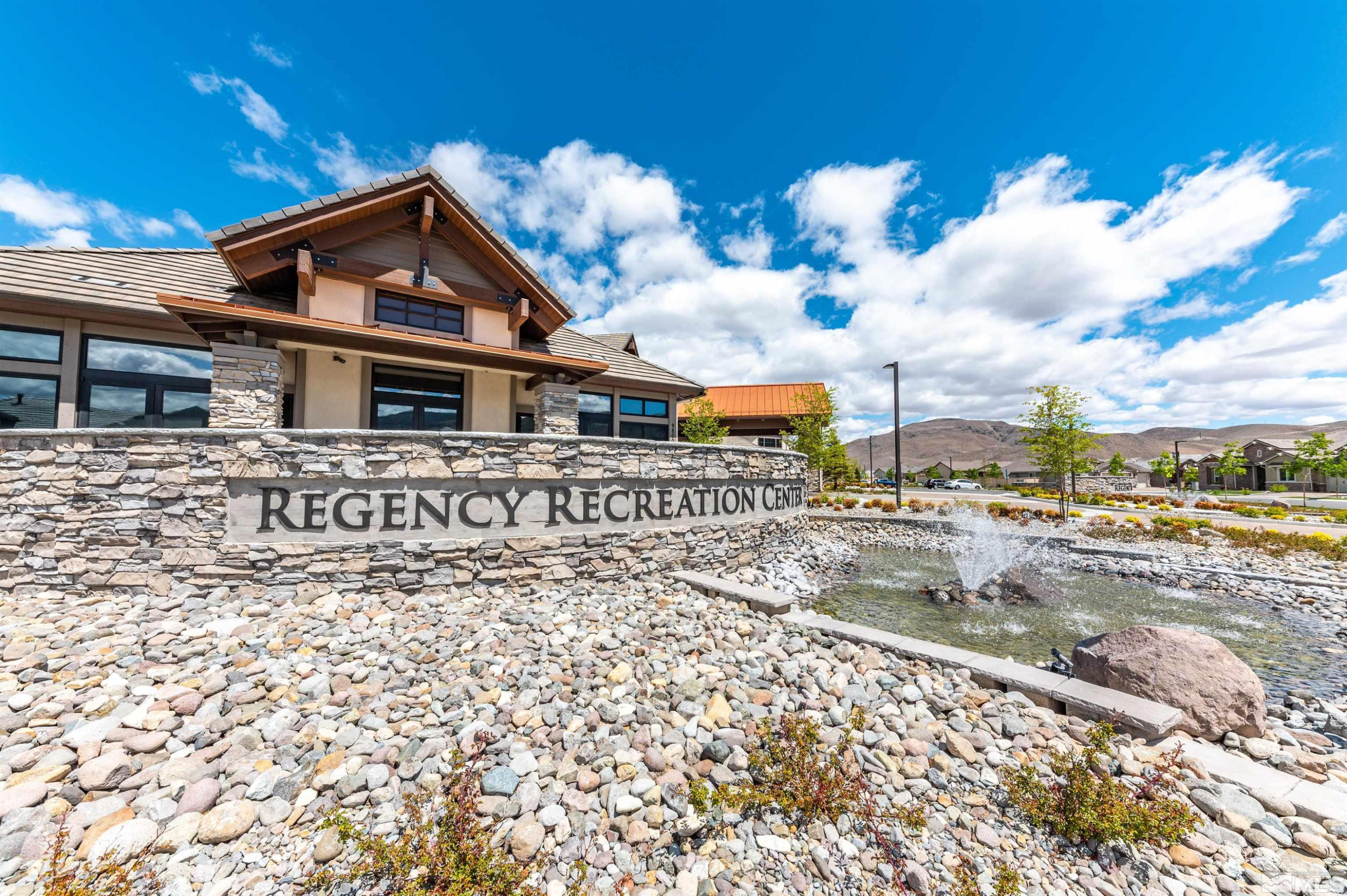 9815 Dyevera Lane Reno, NV 89521 - Photo 37 of 39 a front view of a house with a yard