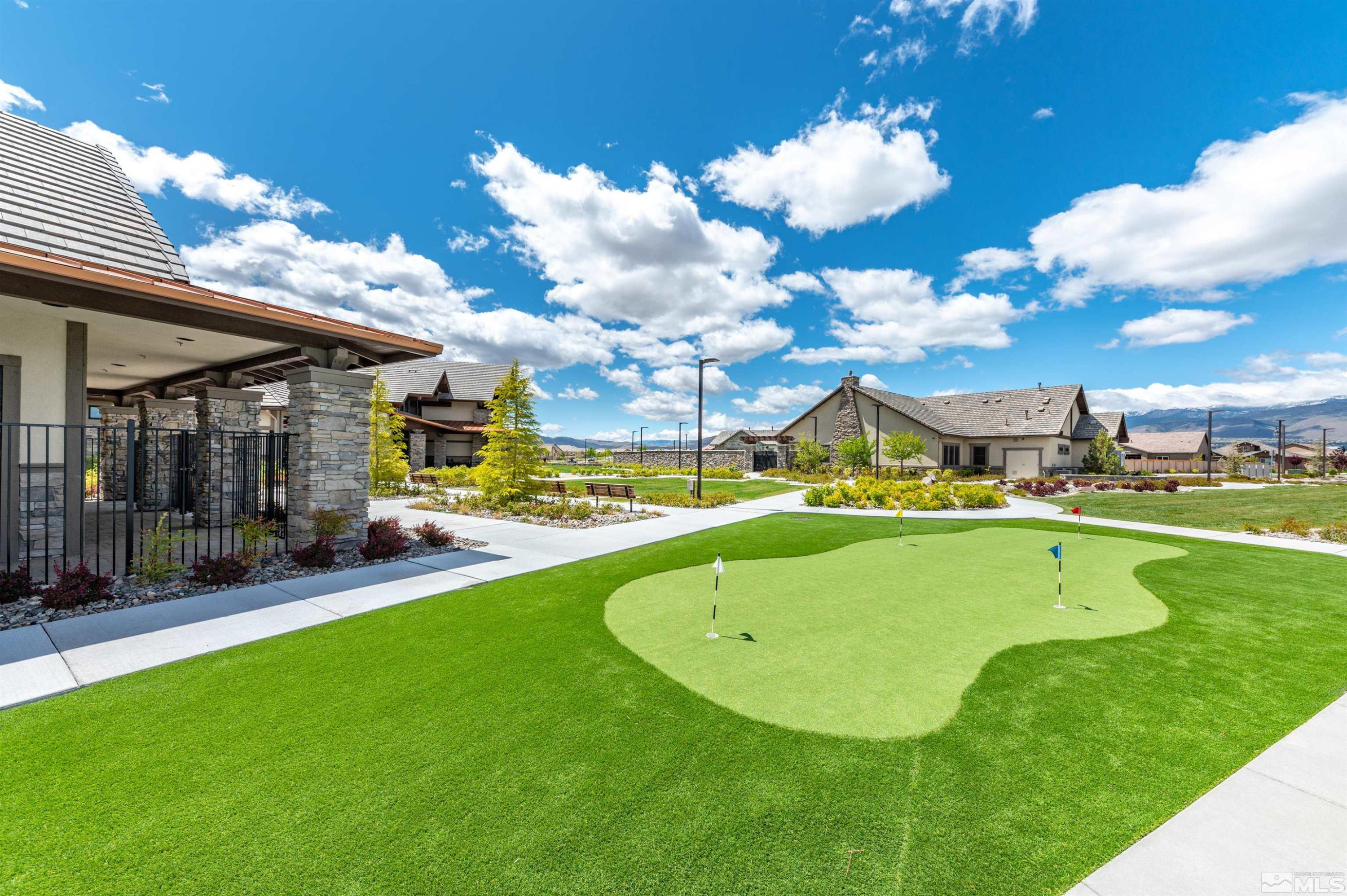 9815 Dyevera Lane Reno, NV 89521 - Photo 39 of 39 a view of a house with a swimming pool