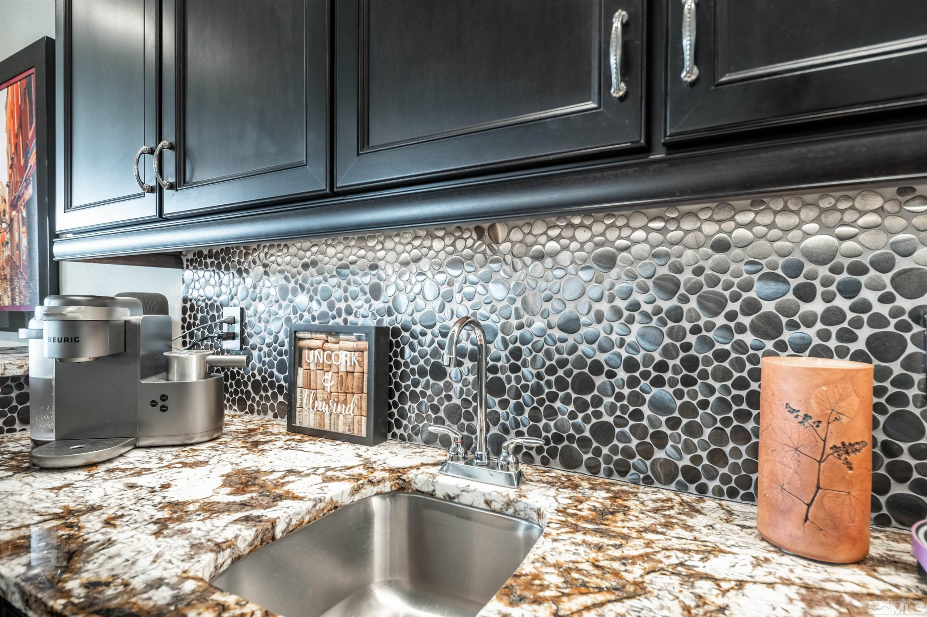 9815 Dyevera Lane Reno, NV 89521 - Photo 7 of 39 a bathroom with a sink and a stove