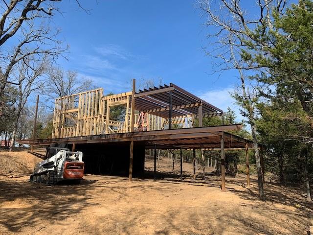 924 The Oil Road Gainesville, TX 76240 - Photo 25 of 39 Erecting Walls and Roof