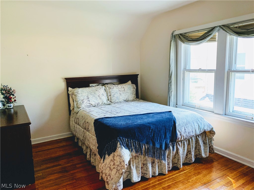 14549 Alger Road Cleveland, OH 44111 - Photo 5 of 27 1 of 2 upstairs bedrooms with beautiful hardwood floors