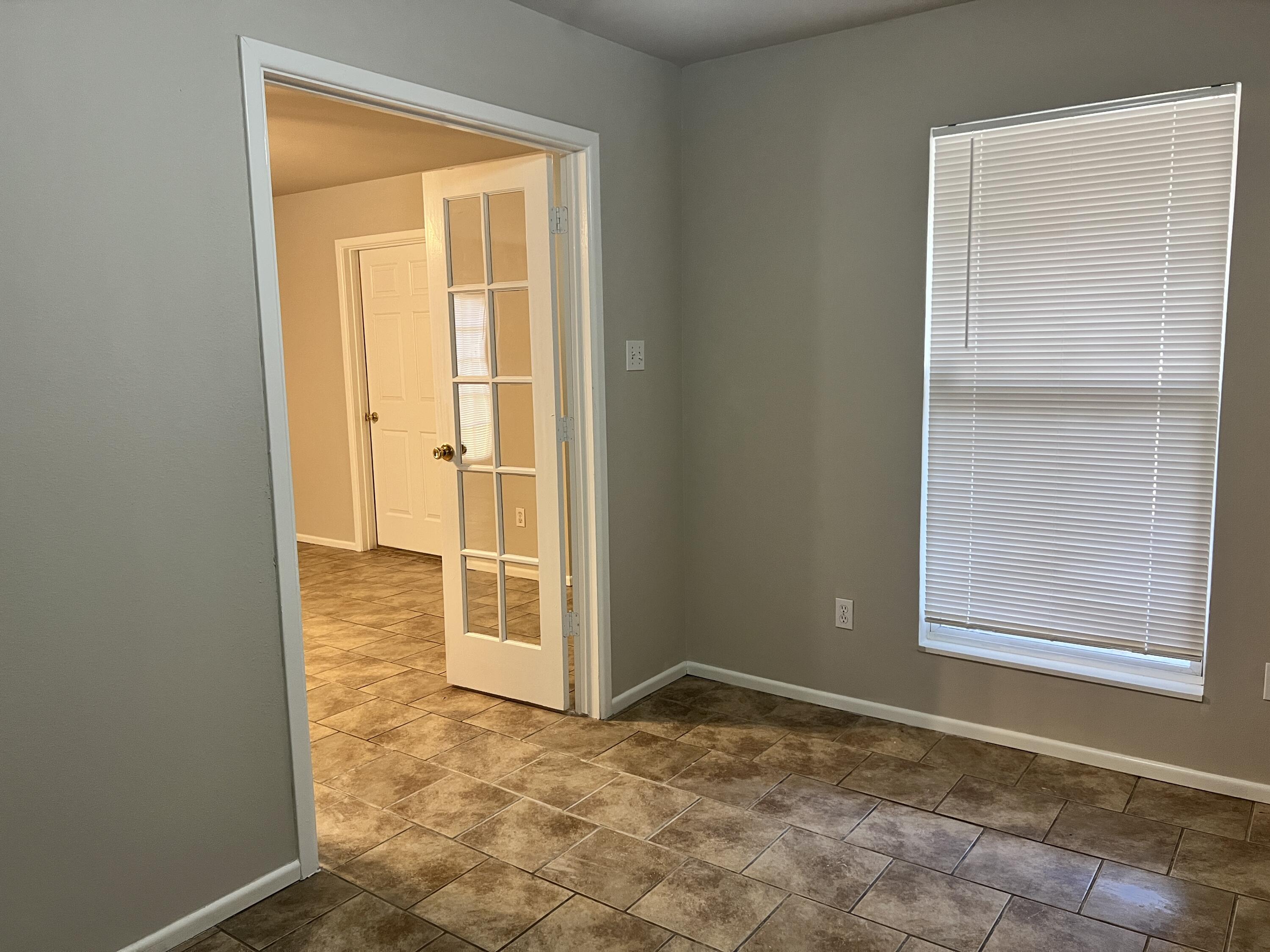 3415 49th Street, Unit B Lubbock, TX 79413 - Photo 17 of 17 an empty room with window