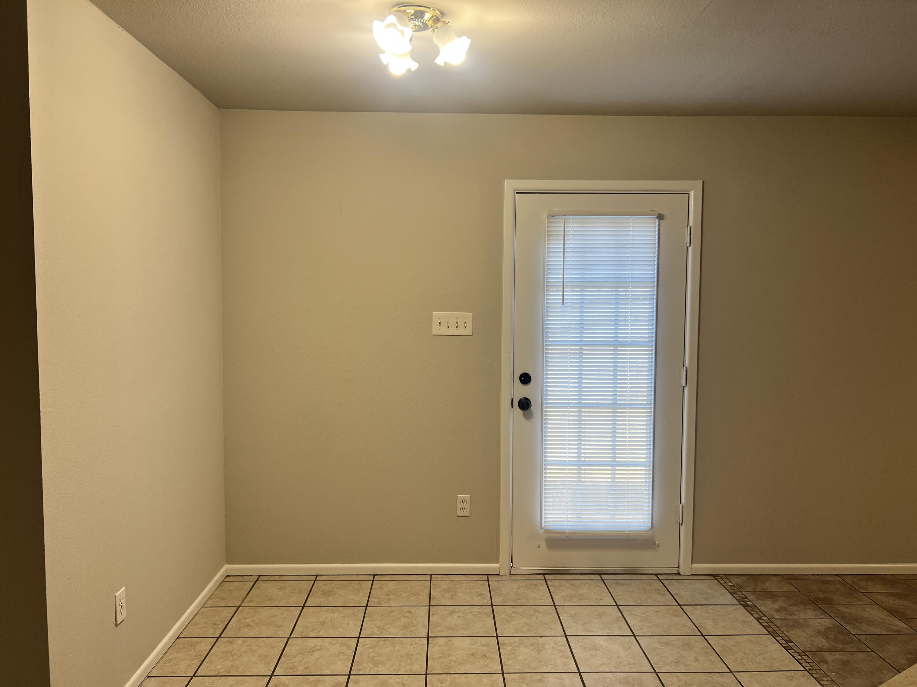 3415 49th Street, Unit B Lubbock, TX 79413 - Photo 5 of 17 a view of an empty room