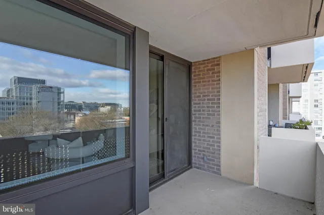 a view of a room that has a glass door
