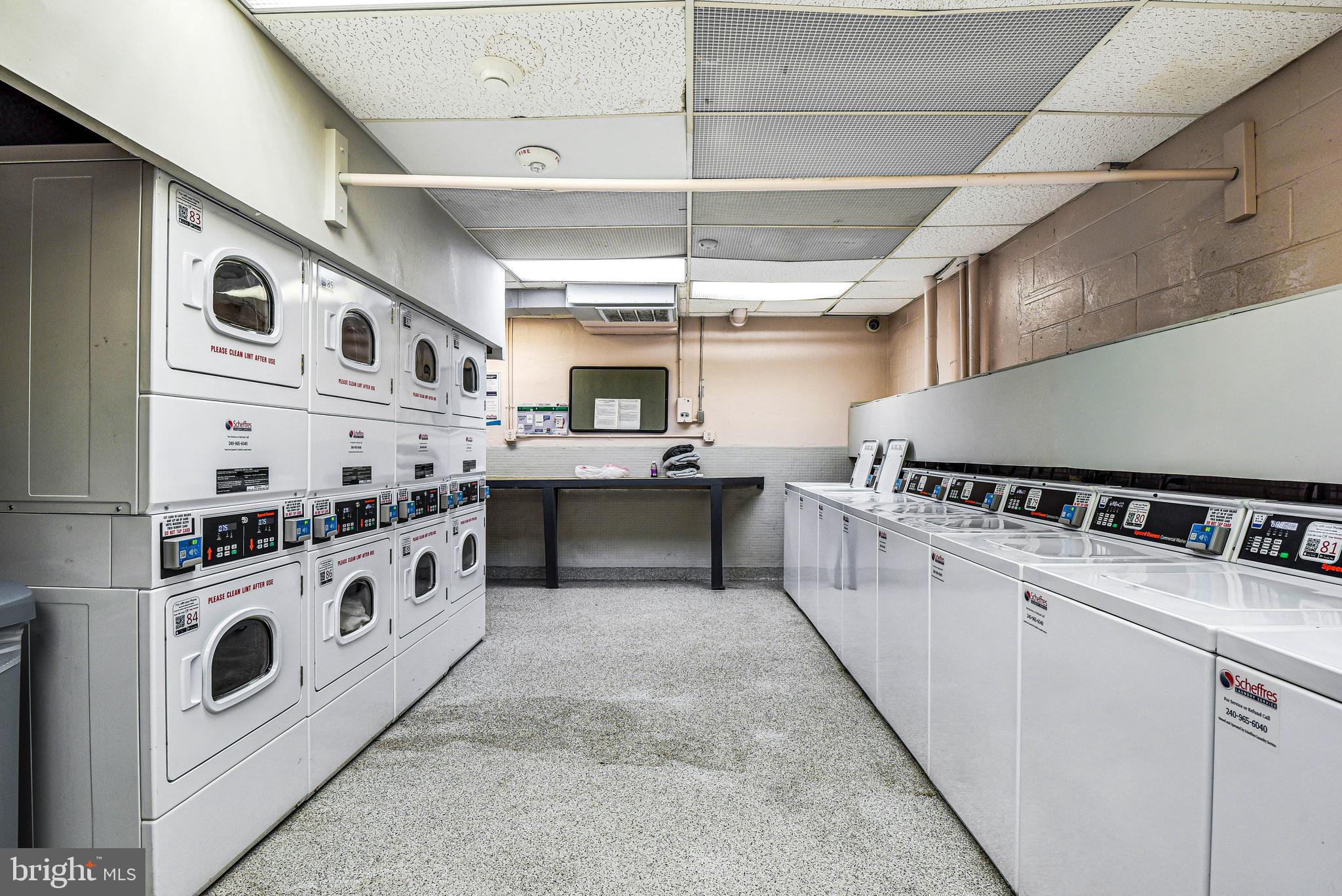 300 M Street Southwest, Unit N508 Washington, DC 20024 - Photo 25 of 32 a kitchen with stainless steel appliances granite countertop a sink and a stove