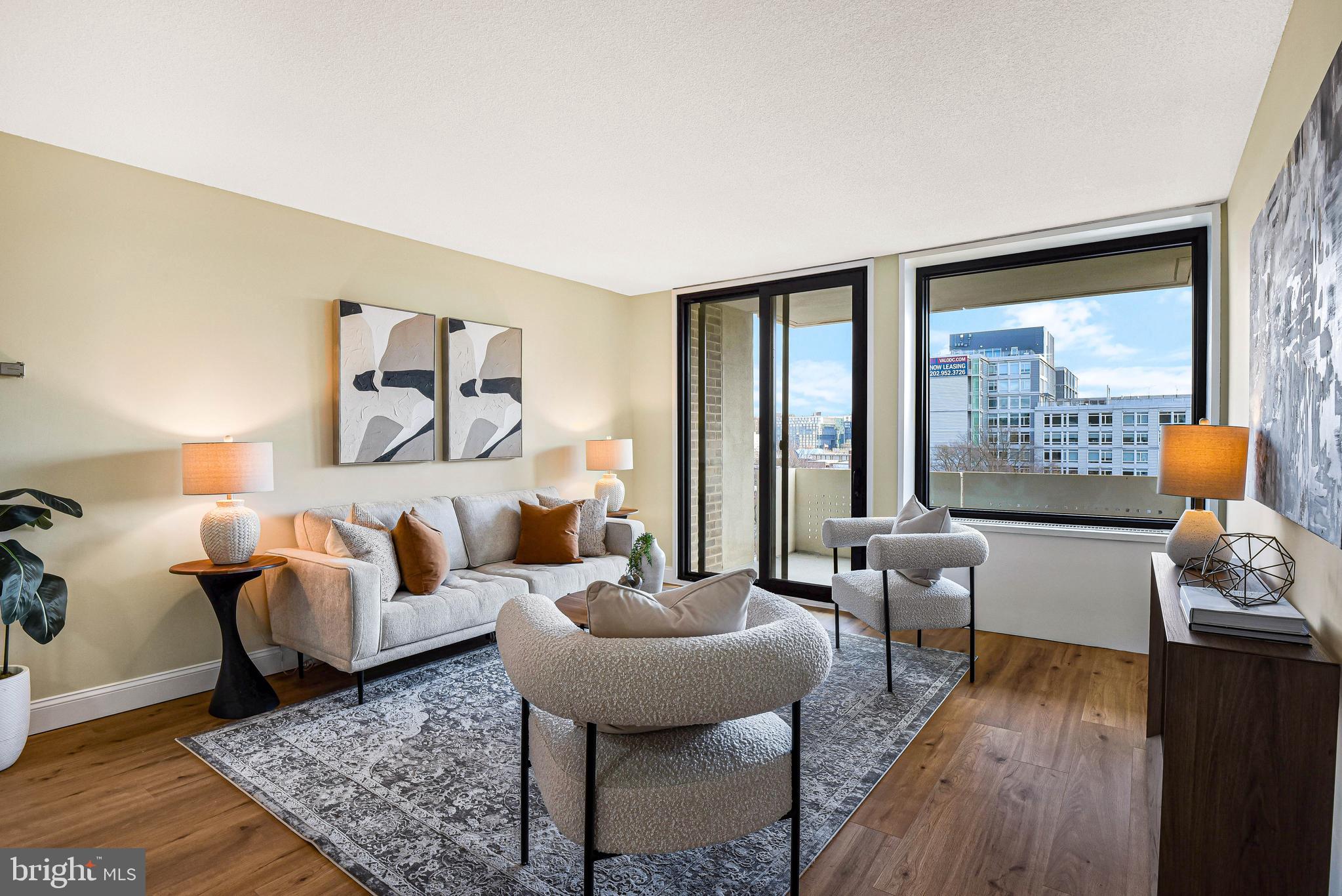 300 M Street Southwest, Unit N508 Washington, DC 20024 - Photo 6 of 32 a living room with furniture and a large window