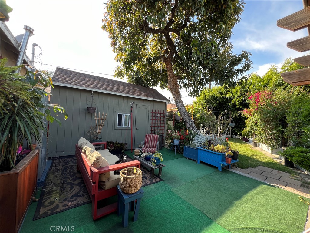 10709 Wheelock Circle Whittier, CA 90606 - Photo 11 of 34 a backyard of a house with table and chairs