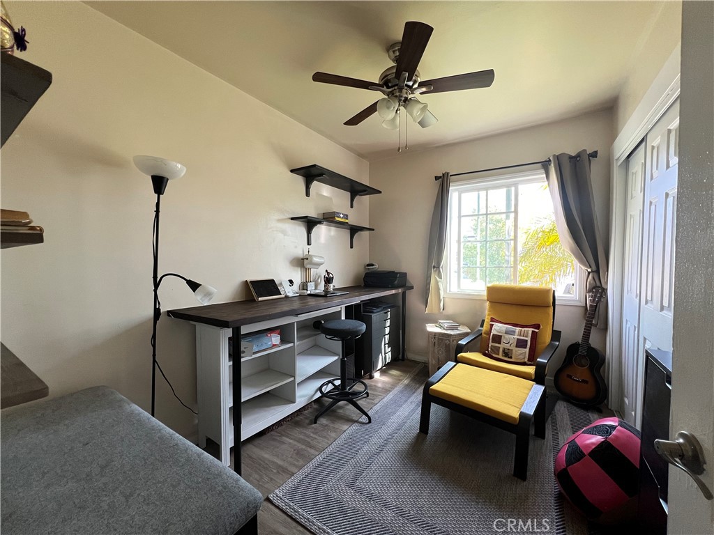 10709 Wheelock Circle Whittier, CA 90606 - Photo 12 of 34 a living room with furniture a window and a flat screen tv