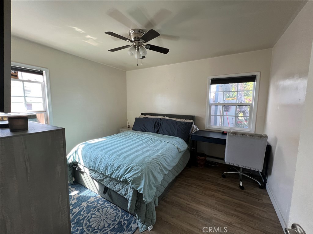 10709 Wheelock Circle Whittier, CA 90606 - Photo 14 of 34 a bedroom with a bed and a window