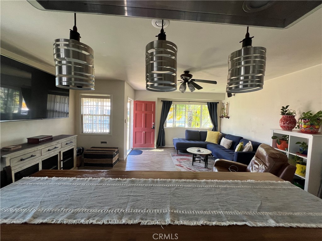 10709 Wheelock Circle Whittier, CA 90606 - Photo 17 of 34 a living room with furniture a flat screen tv and a window