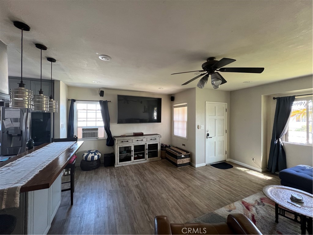 10709 Wheelock Circle Whittier, CA 90606 - Photo 18 of 34 a living room with furniture and a flat screen tv