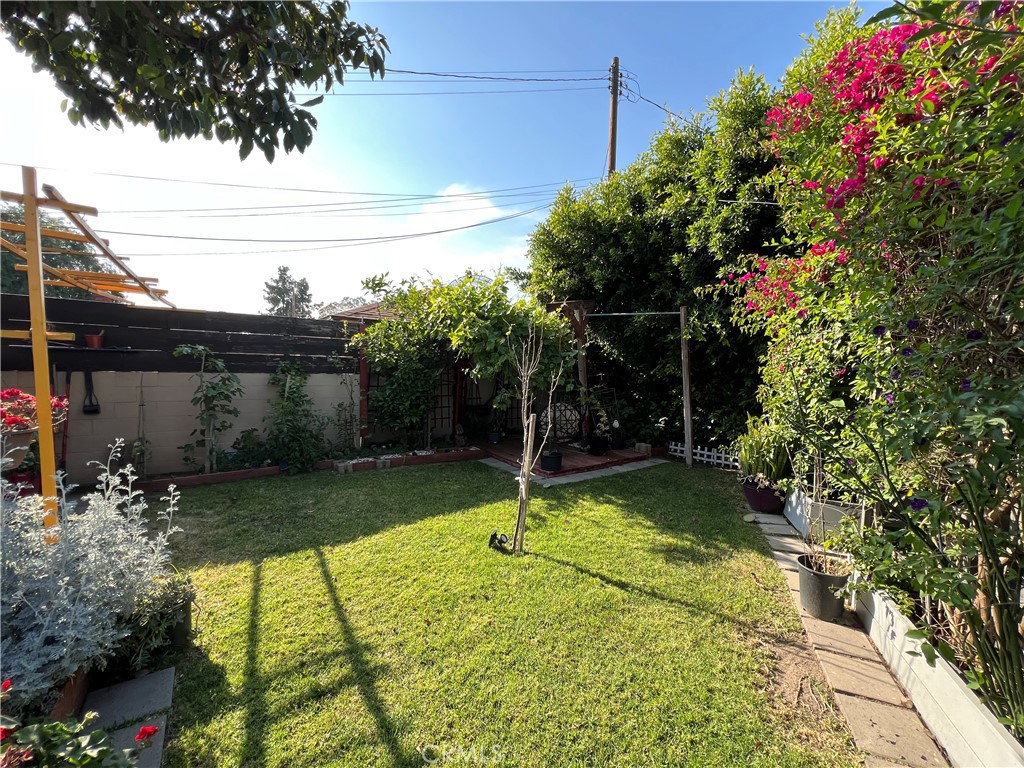 10709 Wheelock Circle Whittier, CA 90606 - Photo 30 of 34 a backyard of a house with lots of green space