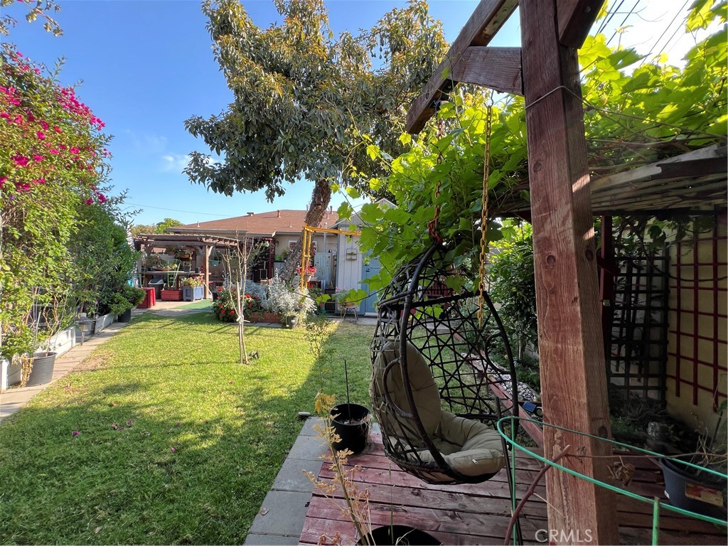 10709 Wheelock Circle Whittier, CA 90606 - Photo 32 of 34 a view of a house with backyard and sitting area