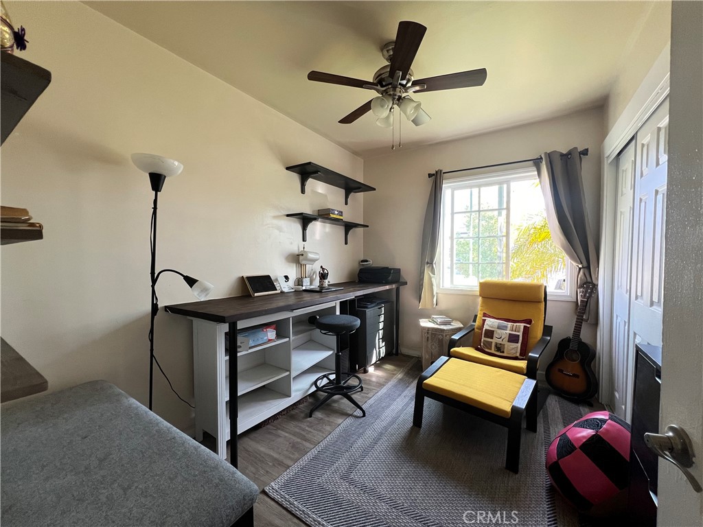 10709 Wheelock Circle Whittier, CA 90606 - Photo 10 of 34 a living room with furniture a window and a flat screen tv