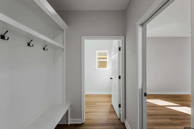 a view of an empty room and window