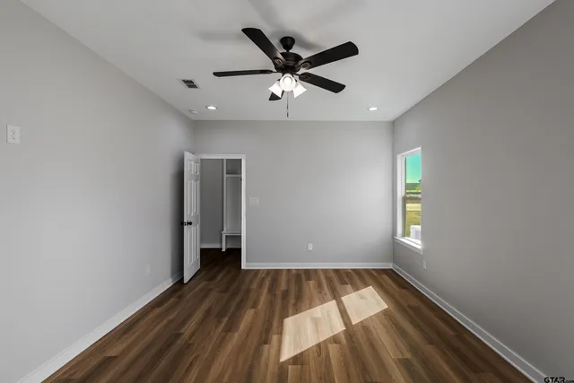 a bathroom with a sink a toilet and bathtub