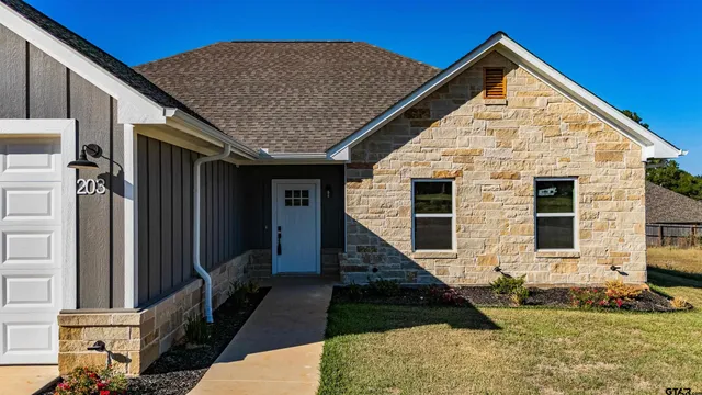 a close view of cabinet a sink and tap