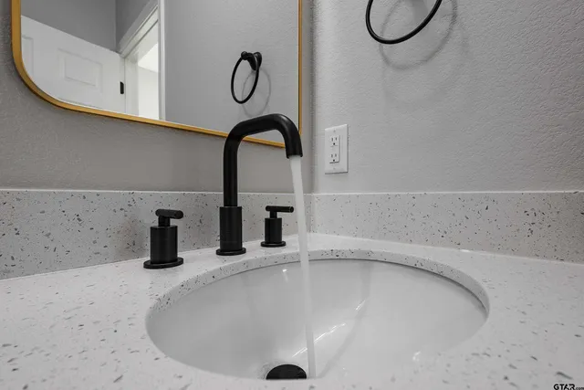 a view of a kitchen sink and window