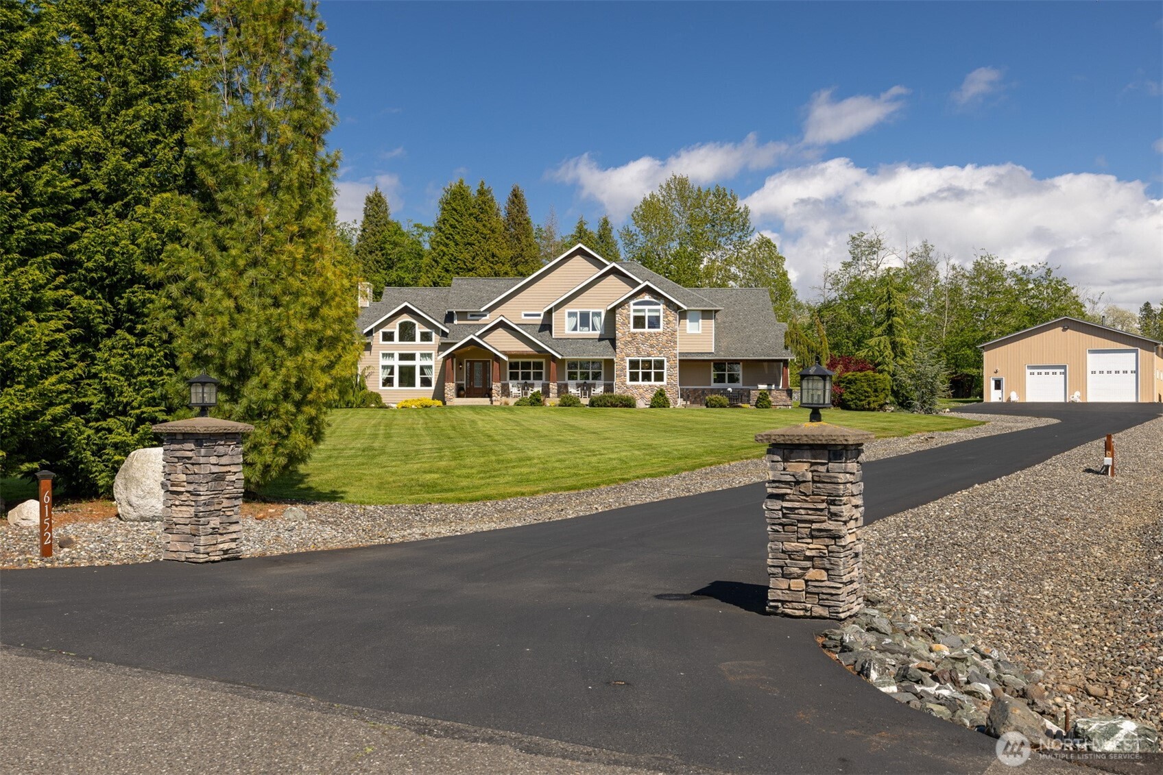 6152 Garrett Lane Ferndale, WA 98248 - Photo 3 of 40 a view of a house with a yard and large tree