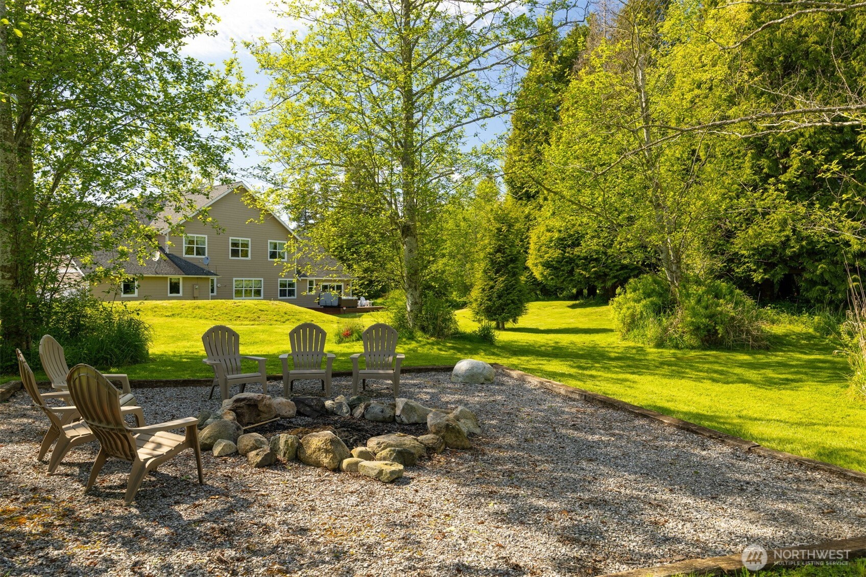 6152 Garrett Lane Ferndale, WA 98248 - Photo 33 of 40 a view of a swimming pool with a backyard