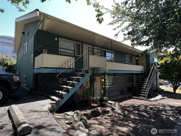 a front view of a house with parking