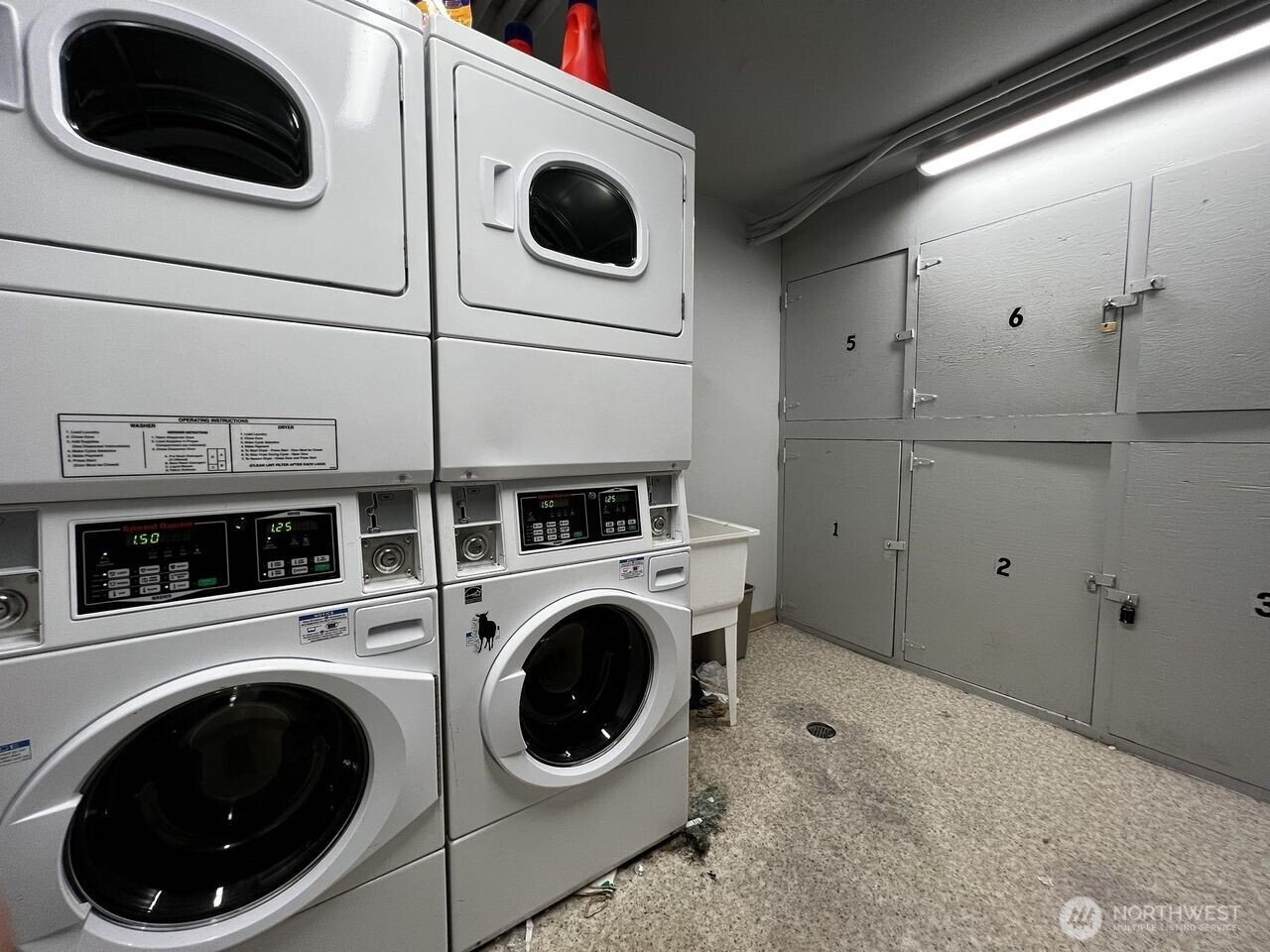 4200 Fremont Avenue North Seattle, WA 98103 - Photo 15 of 17 a view of kitchen with a washer and dryer