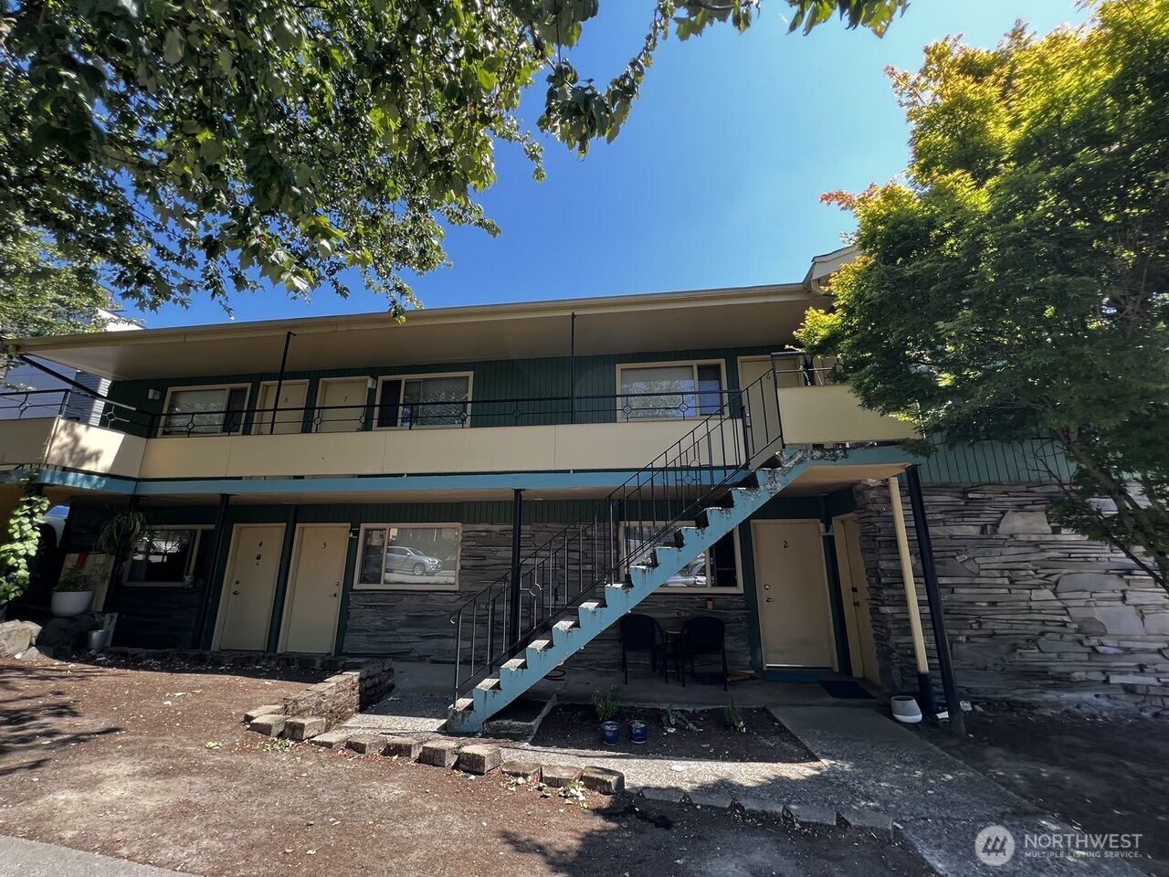 4200 Fremont Avenue North Seattle, WA 98103 - Photo 2 of 17 a front view of a house with parking