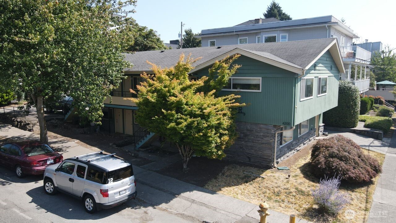 4200 Fremont Avenue North Seattle, WA 98103 - Photo 4 of 17 a front view of a house with garden
