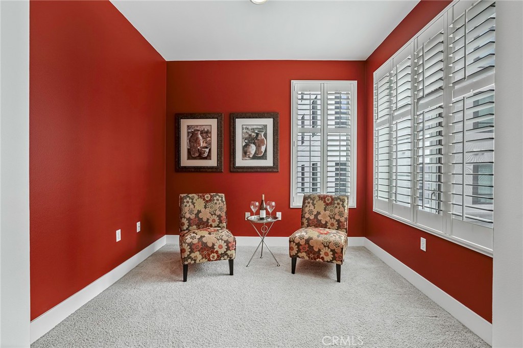 150 The Promenade North, Unit 202 Long Beach, CA 90802 - Photo 20 of 59 a living room with furniture and large windows