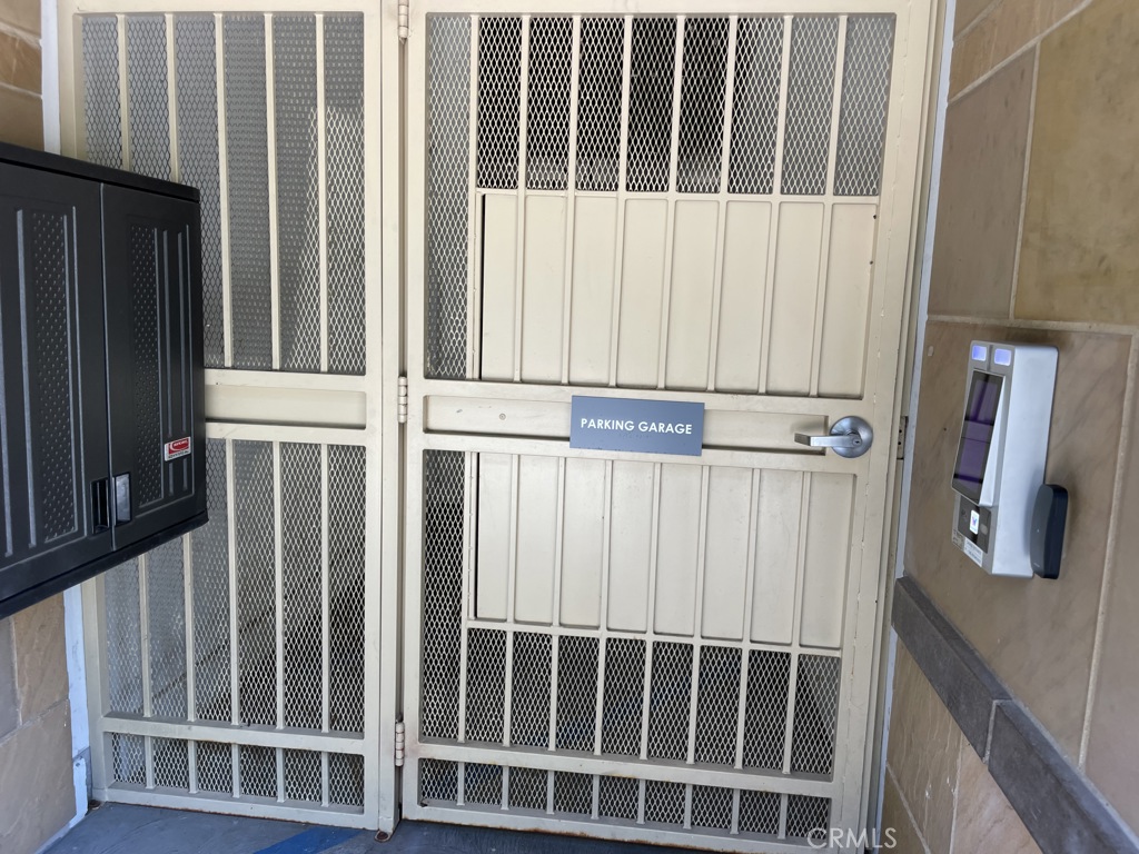 150 The Promenade North, Unit 202 Long Beach, CA 90802 - Photo 2 of 59 a view of wooden fence