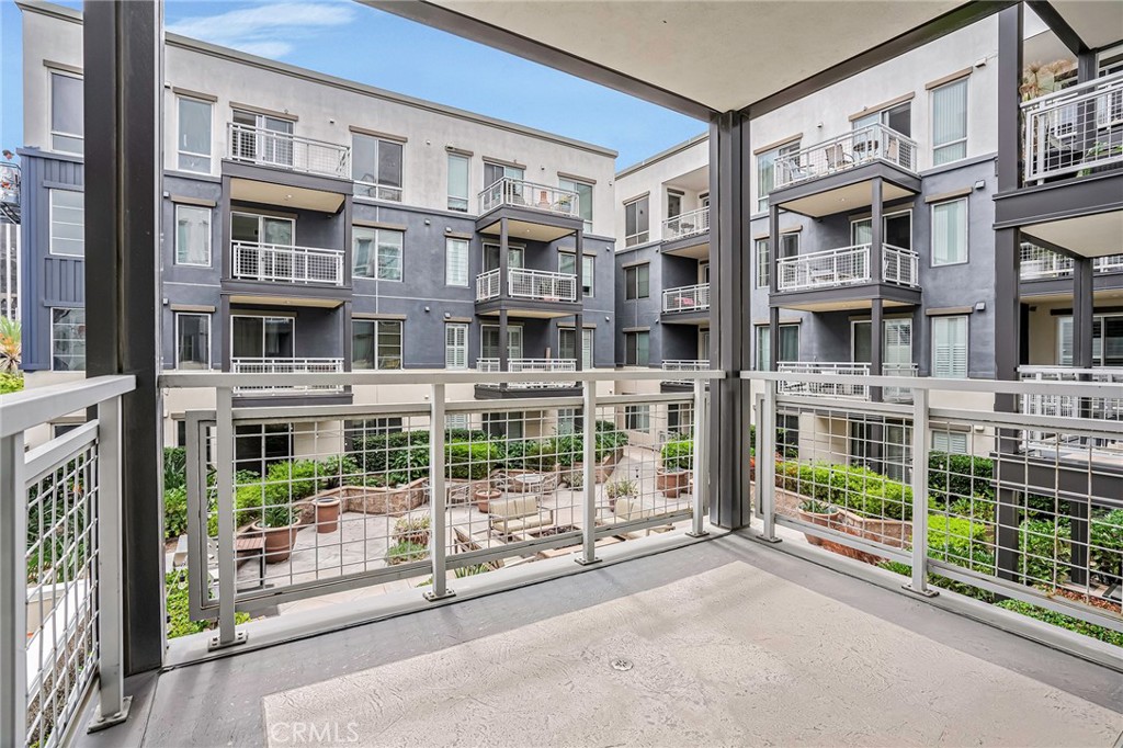 150 The Promenade North, Unit 202 Long Beach, CA 90802 - Photo 21 of 59 a view of a building with glass door