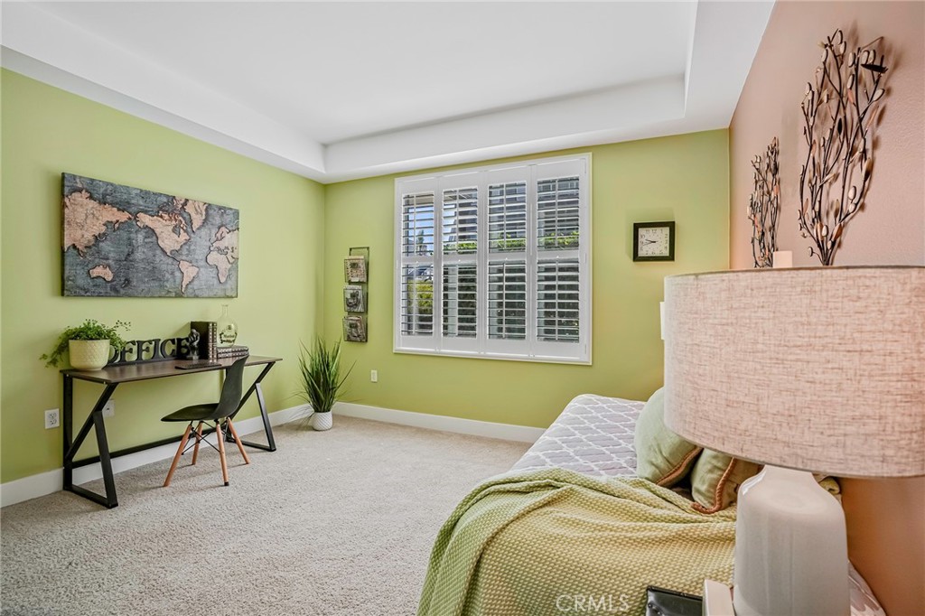 150 The Promenade North, Unit 202 Long Beach, CA 90802 - Photo 24 of 59 a living room with furniture and a window